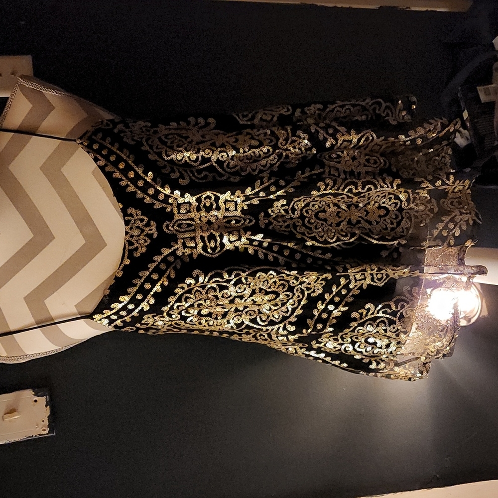 Spaghetti strap black and gold shirt